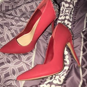red heels with jewels on the back